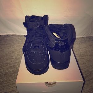 Authentic black high top air forces.