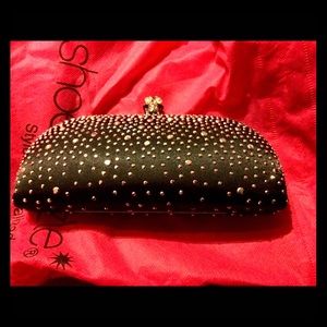 NWOT ShoeDazzle black "bedazzled" clutch w/skull