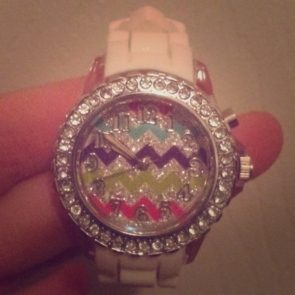 A studded, sparkly wrist watch