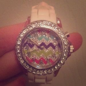 A studded, sparkly wrist watch