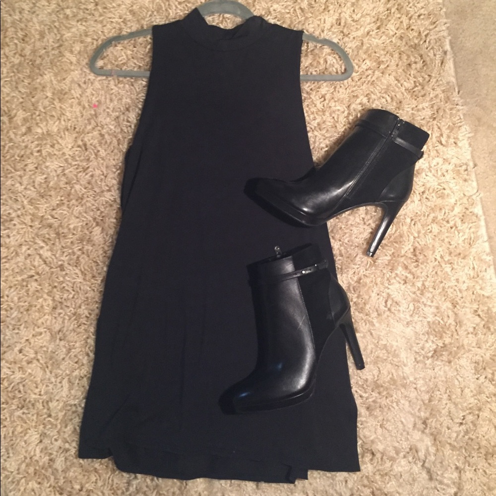 Black long slit top. Shoes not included