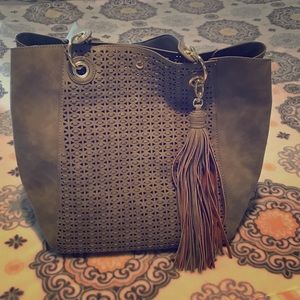 Steve Madden moss tote with large pouch.