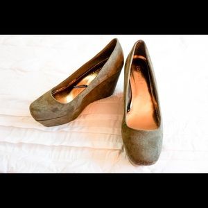 Never before worn olive velvet platforms