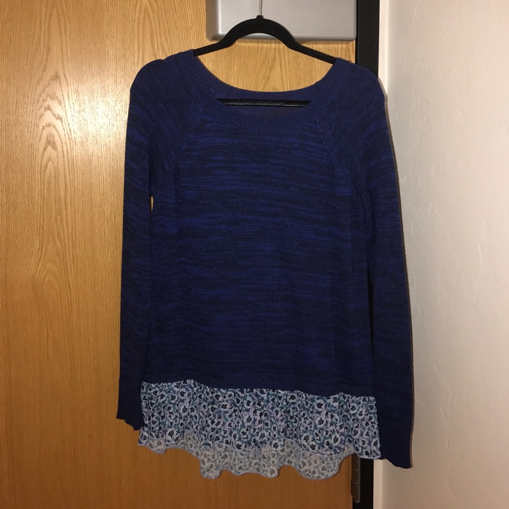 Sweater with floral accent