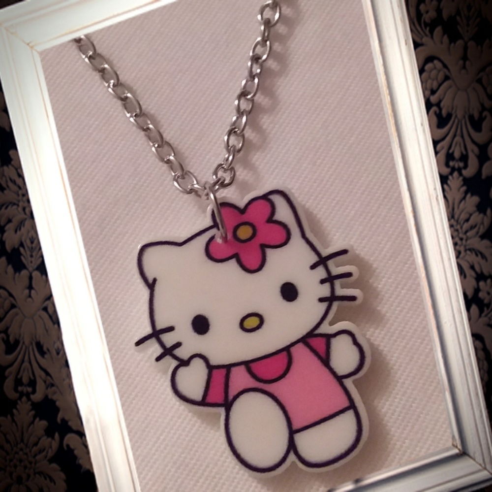Kitty acrylic necklace,  pink shirt