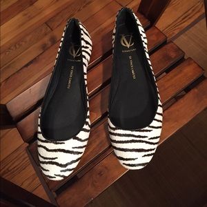 Calfskin zebra print flats with zipper detail