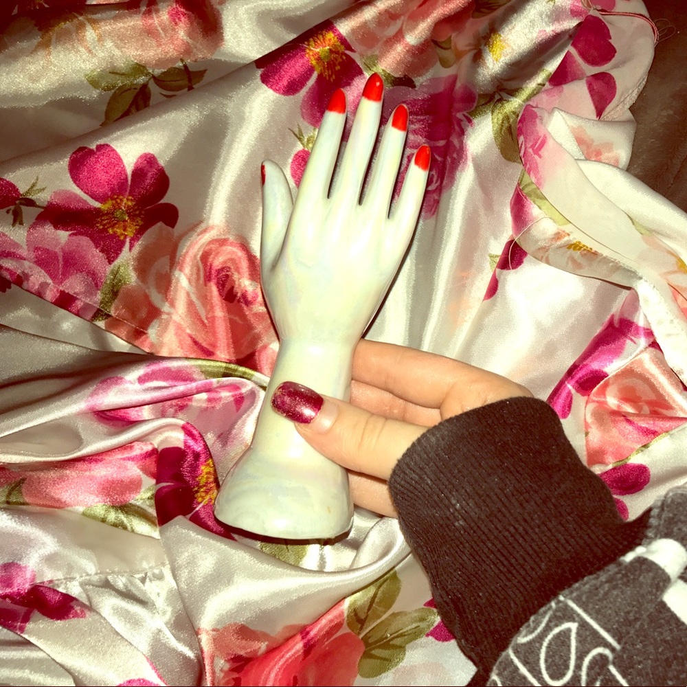 Glass hand for jewelry and decor