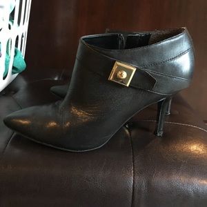 Black w gold buckle zip bootie high heels