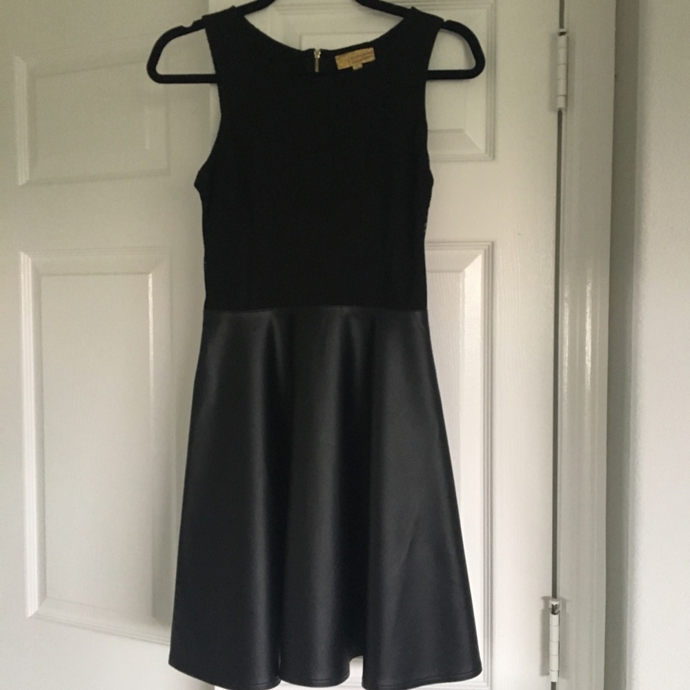 Black skater dress with faux leather skirt