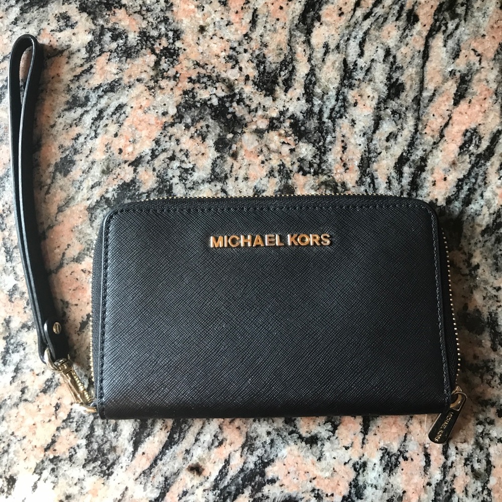 Black Michael Kors wristlet w/ gold