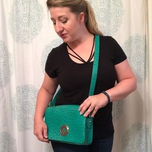 Timeless design purse with adjustable strap