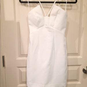 White structured sleeveless dress with straps