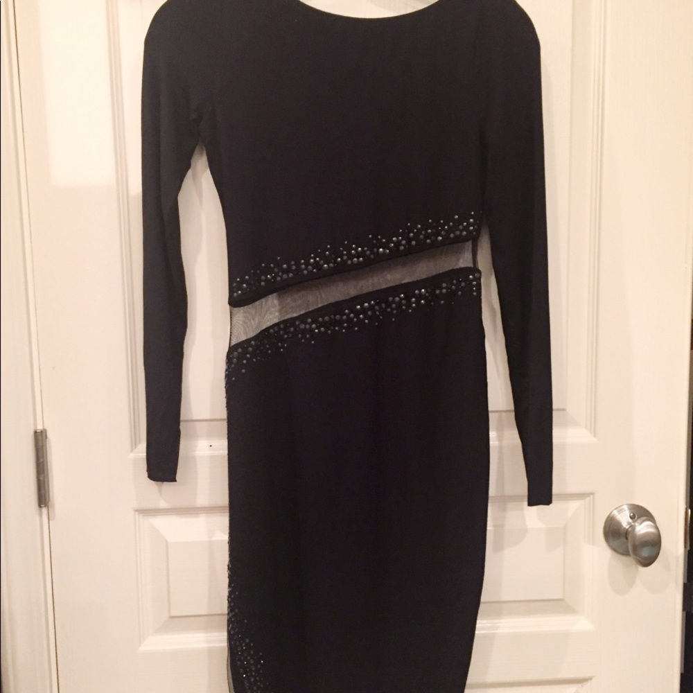 Black long sleeve knit dress with mesh panel