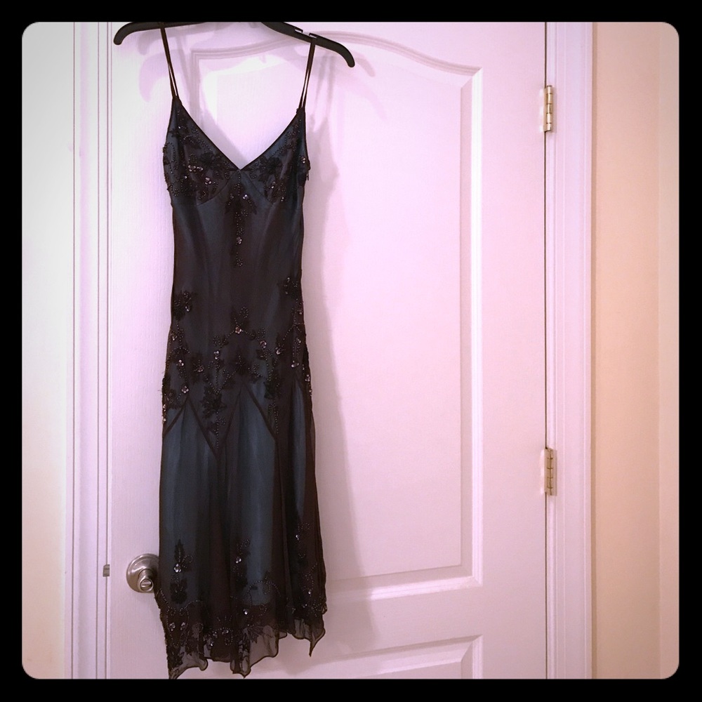 Knee length cocktail dress .  Size Petite 4