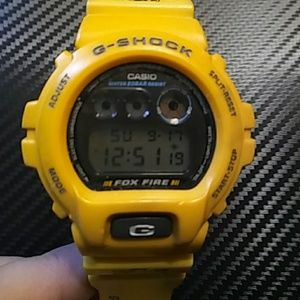 Yellow g shock watch
