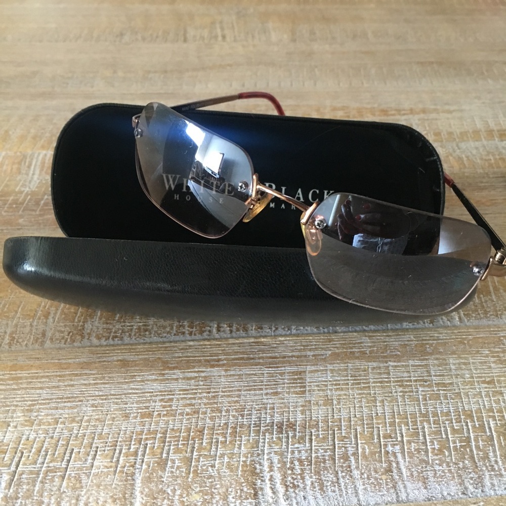 Gold/brown lens sunnies.