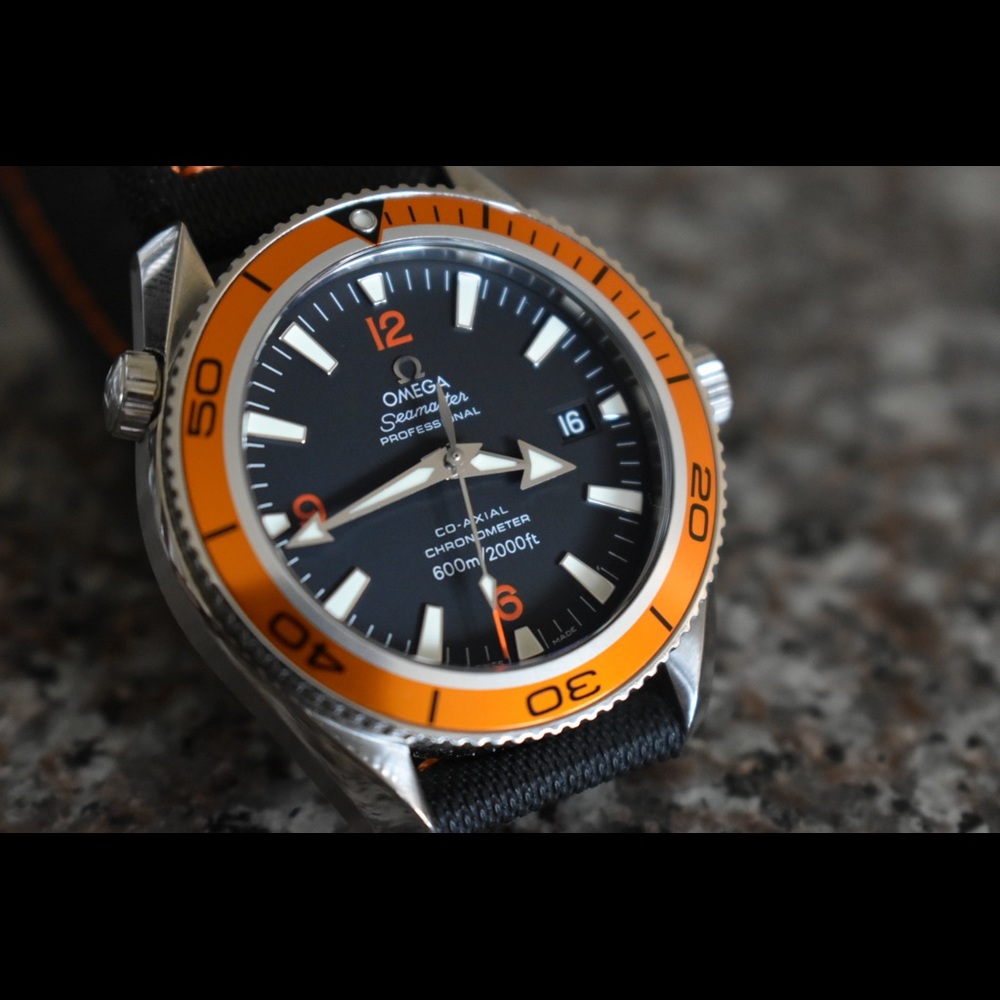 Omega planet ocean seamaster 42mm orange bezel