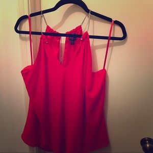 Silver chain raps around your neck