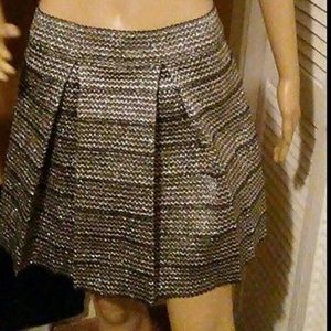 Romeo and Juliet couture skirt, silver metallic.