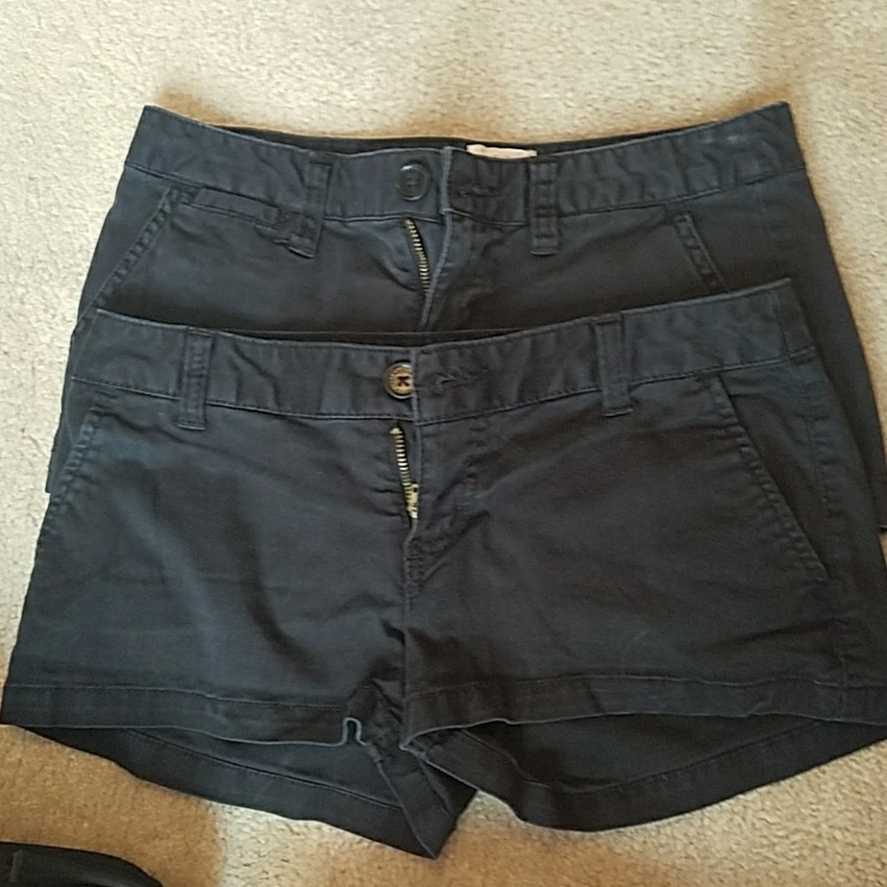 Two pairs of black shorts