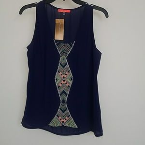 Lulumari Embroidered front navy tank top