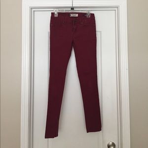 Burgundy skinny jeans