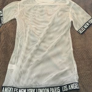 I'm selling a mesh white long blouse