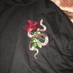 Black hoodie with rose. Long fit, zippers on side
