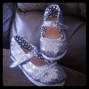 Little girls Tom's never worn.