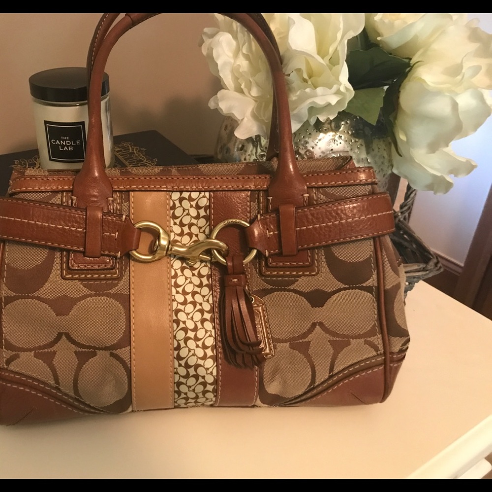 Authentic coach signature stripe handbag.