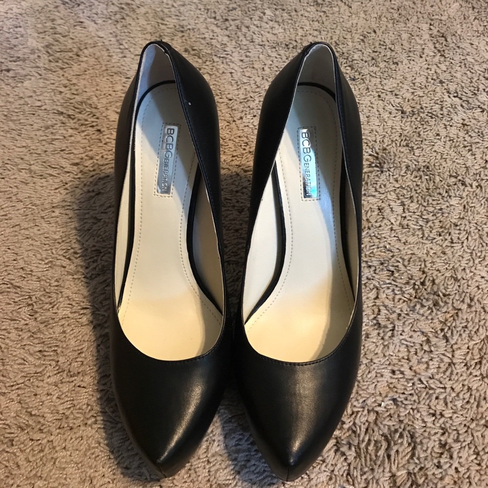 Tall, black, size 8.5 pumps!