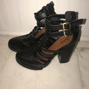 Fun and comfortable black faux leather platforms.