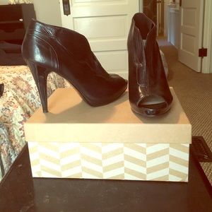 Booted heels with peep toe