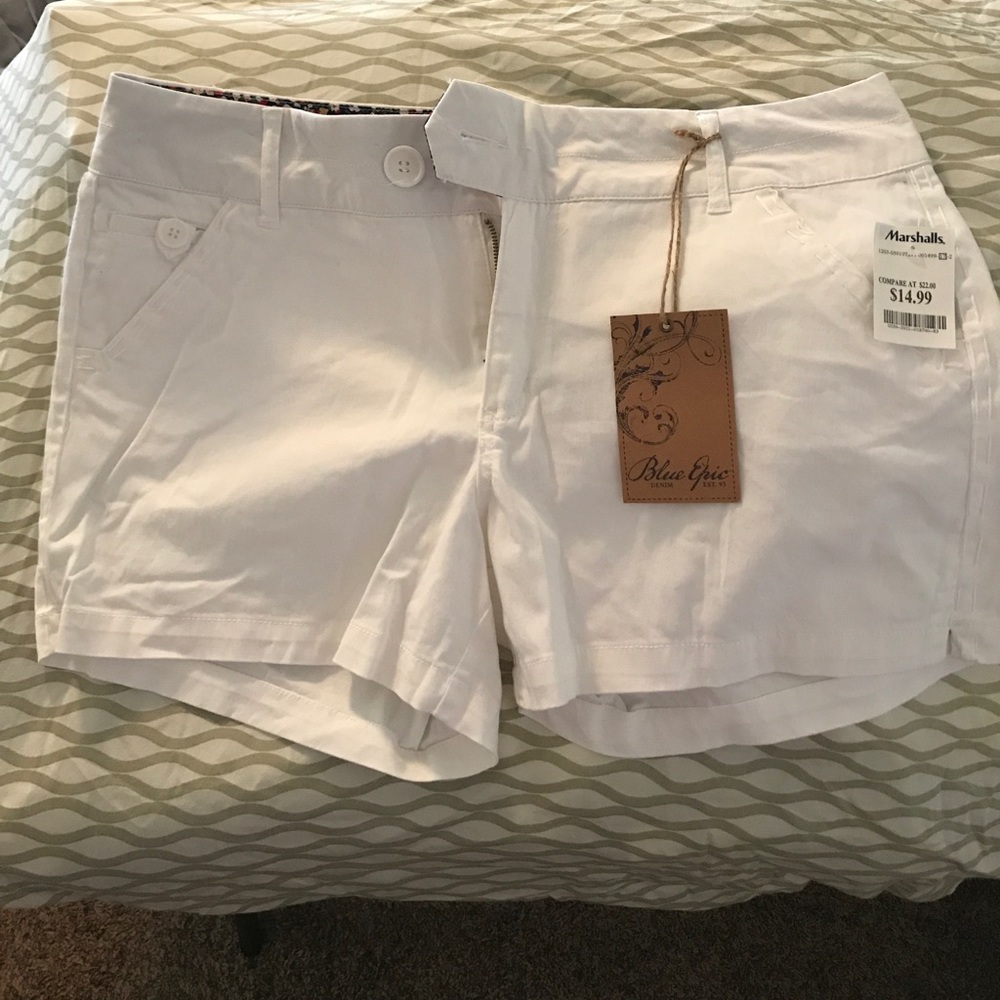 Blue Epic Stretchy white shorts size 16.