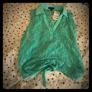 Very cute lace front shirt.