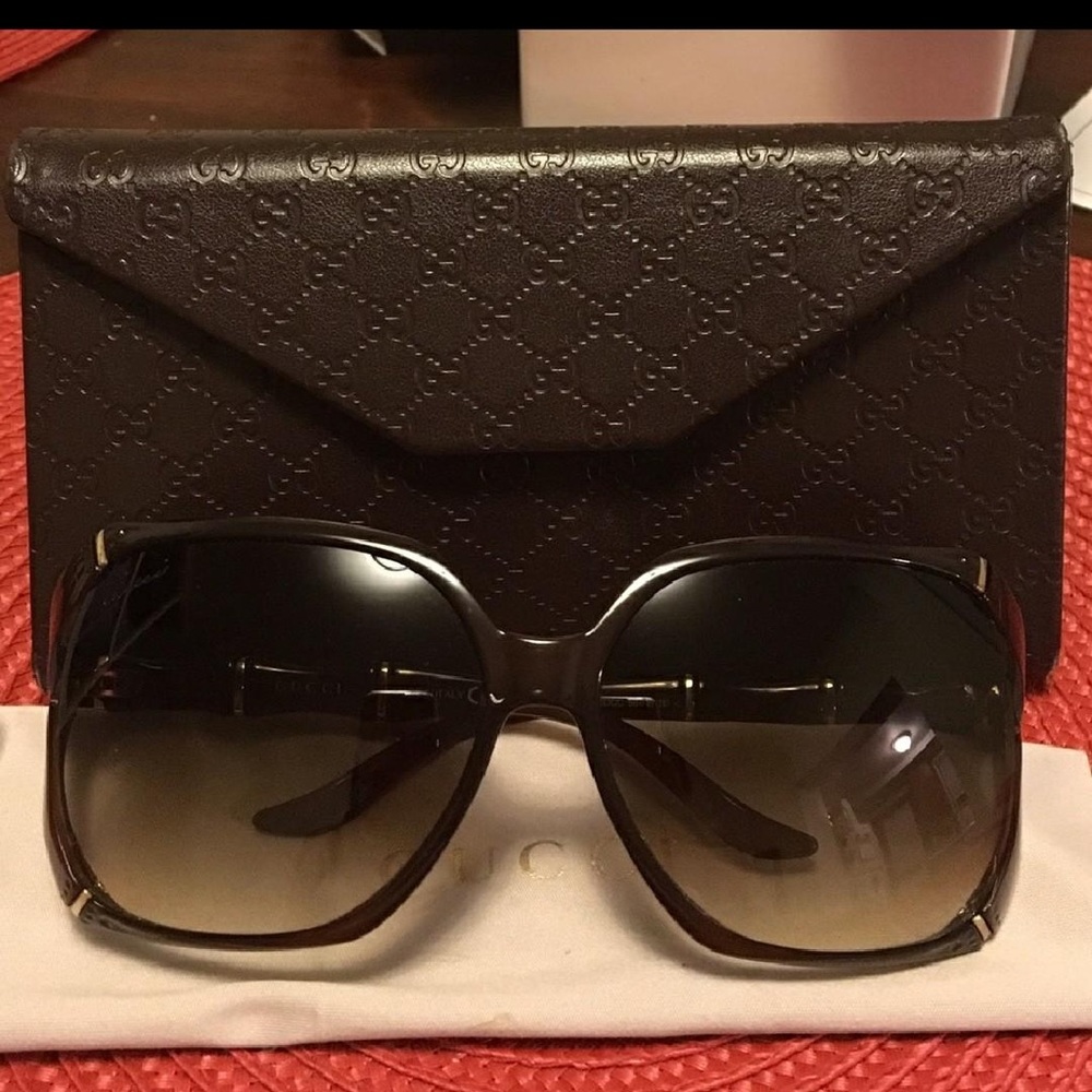 Women's authentic bamboo Gucci Sunglasses.