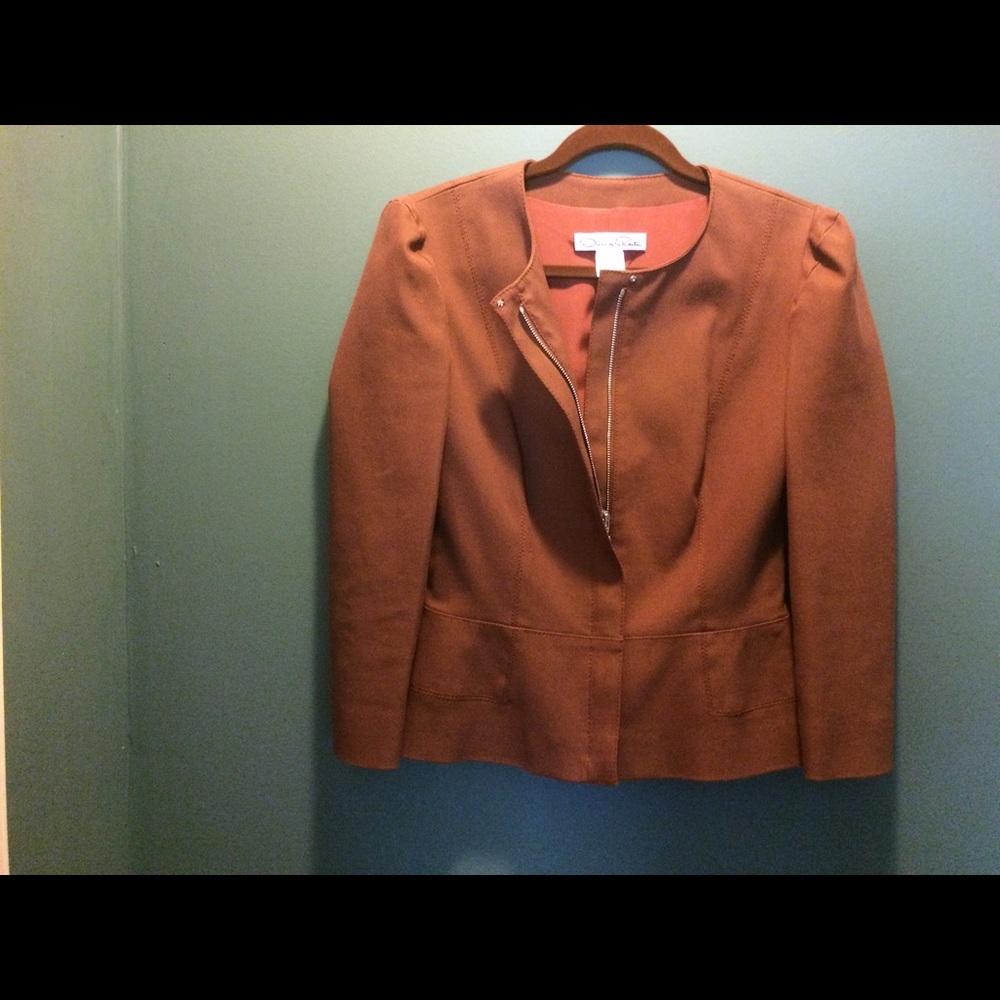 Oscar de la Renta Suit.