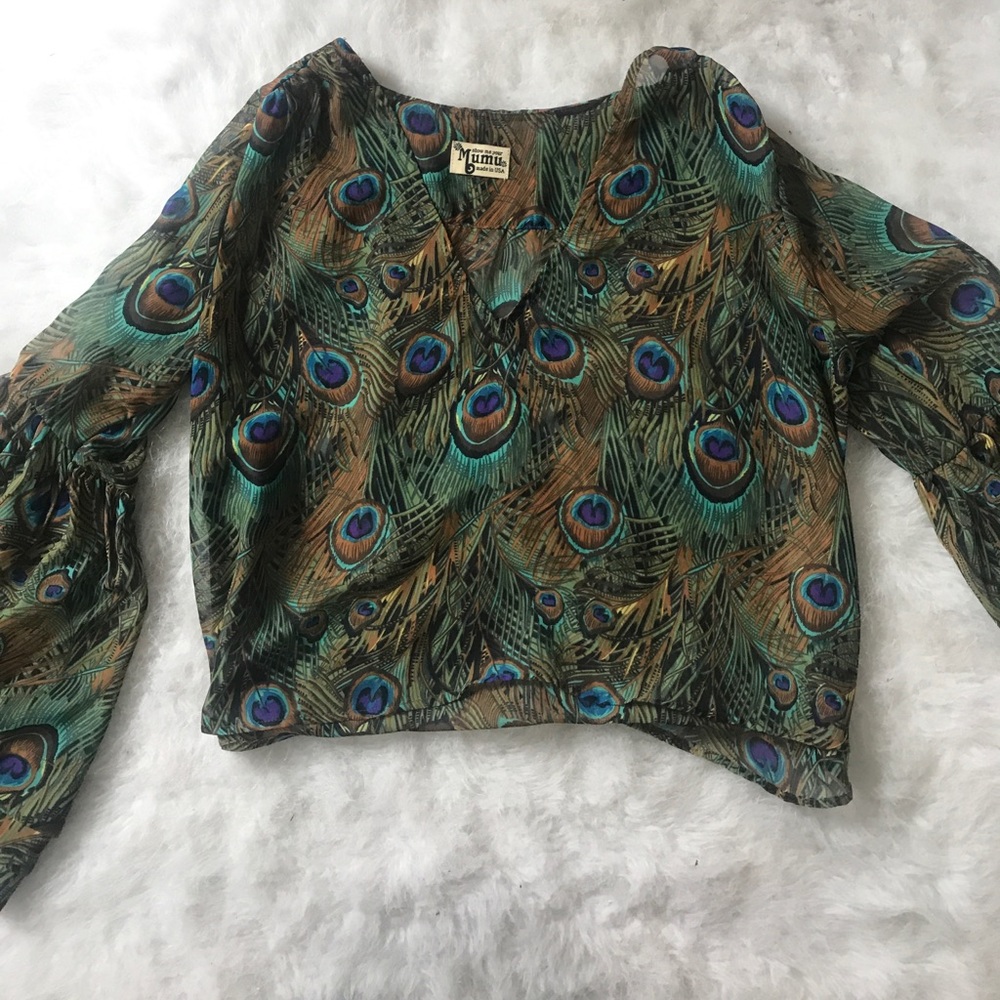 Flowy peacock print top with bell sleeves