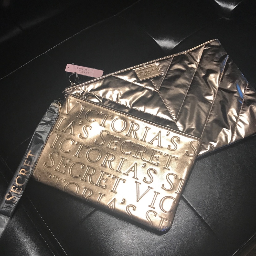 Brand new Victoria Secret gold clutch set