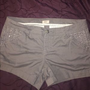 buckle gray shorts with bling