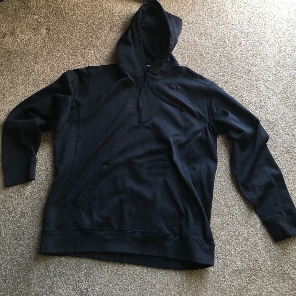 Black Nike hoodie .