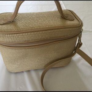 Cute straw zip bag with long strap.