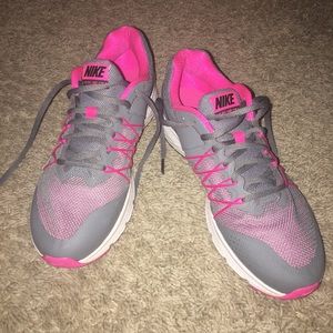 Gray and Pink Nike sneakers