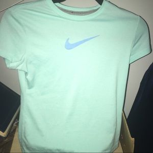 Light blue Nike dri-fit top