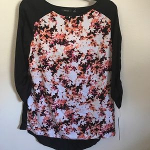 Cute loose fitting tunic with open back detail