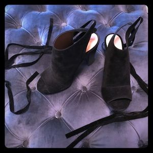 Black wedges with ties around ankle