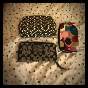 Authentic Coach wallet, and 2 make up bags.