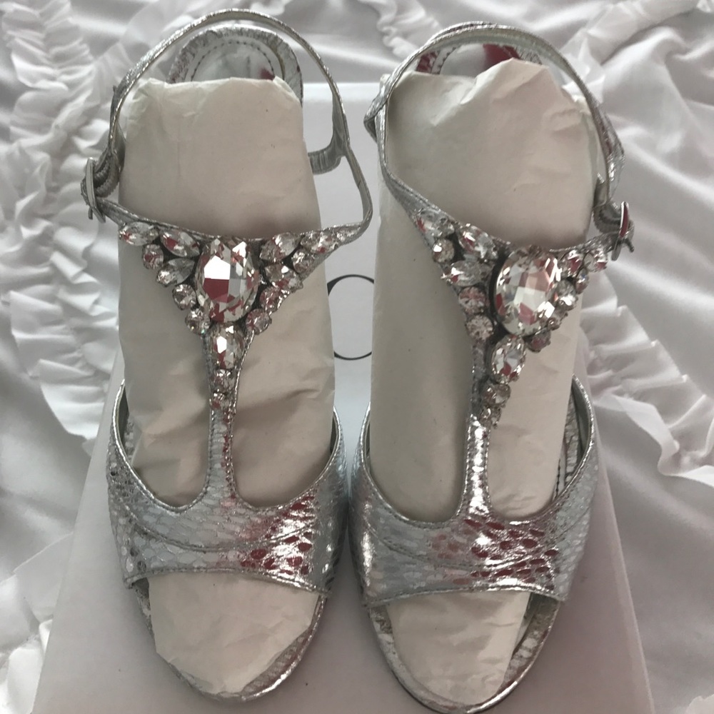 Caparros Silver evening shoes.