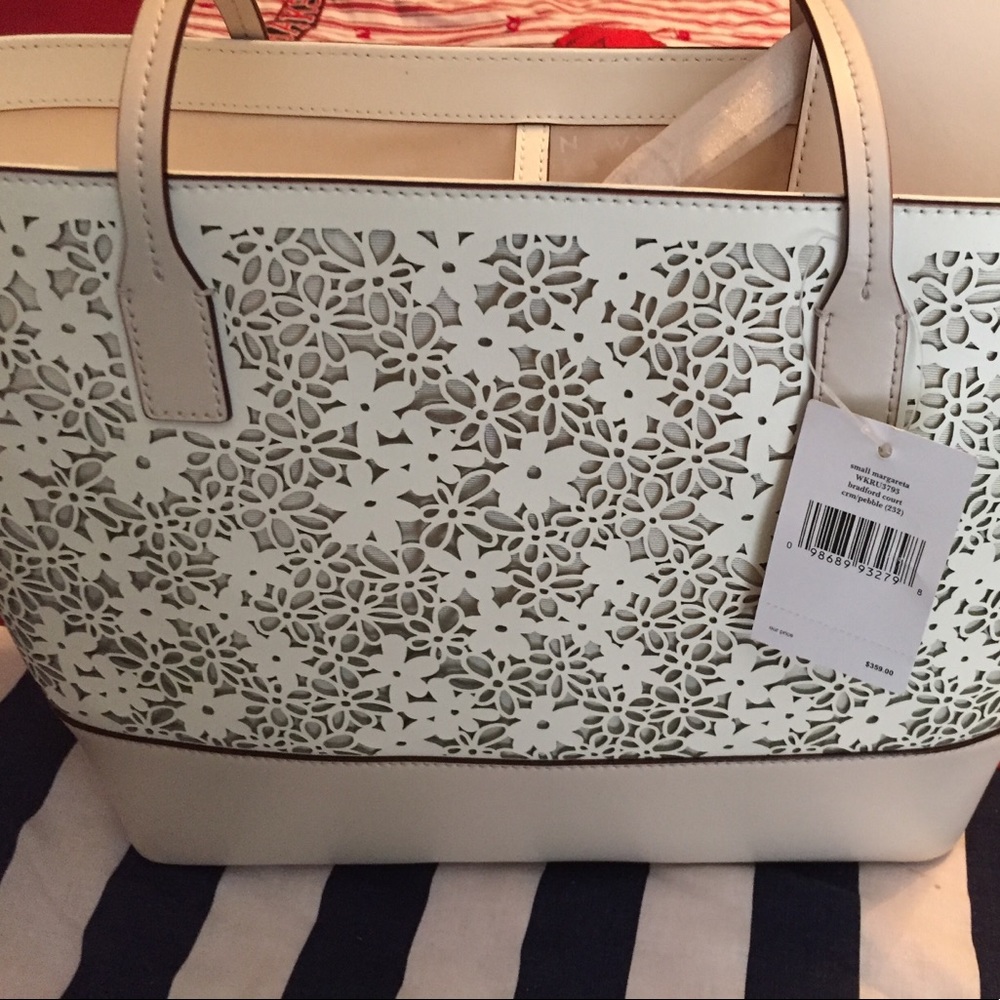 Kate Spade New York Tote with wristlet.