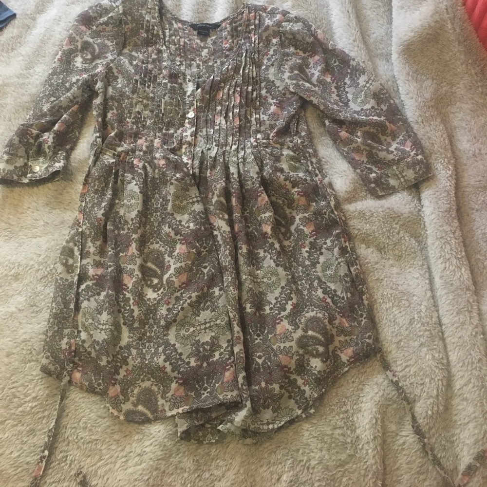 Printed button up blouse with a tie waist